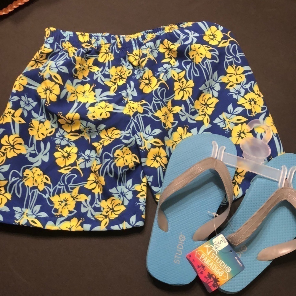 New boys swim trunks and sandals